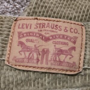 Levi’s, crème color, men’s small.
